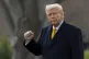  President Donald Trump pumps his fist before departing on M