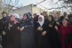 Relatives and neighbours mourn during the funeral procession