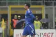 Como's Dele Alli leaves the pitch after receiving a red card