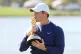 Rory McIlroy during a trophy ceremony after winning a playof
