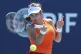 Emma Raducanu hits a return to Emma Navarro during the Miami