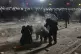 Protesters clash with riot police during a protest against t