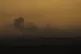 Smoke from Israeli bombardment rises from the Gaza Strip as 