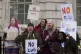 Protesters demonstrate as Chancellor Rachel Reeves is about 