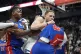 Minnesota Timberwolves guard Donte DiVincenzo (0), middle, a
