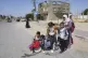 Displaced Palestinians, who flee from Rafah, arrive in Khan 