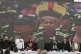 Colombia's President Gustavo Petro (centre) stands for the p