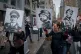 People carry signs during a 