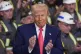 President Donald Trump listens to Jeff Crowe speak during an