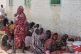 Sudanese displaced families take shelter in a school after b