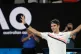 Roger Federer celebrates after defeating Tomas Berdych at th