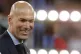 Zinedine Zidane smiles after winning the Champions League Fi