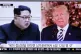 Portraits of Kim Jong Un and Donald Trump appear on South Ko