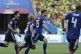 Japan's Yuya Osako (centre) celebrates with teammates after 