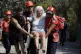 Members of a rescue team carry an injured woman in Mati, eas