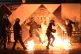 Police are attacked with petrol bombs as they struggle to co
