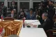 Chinese Premier Li Qiang (right) delivers his opening remark