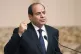 Egyptian President Abdel Fattah el-Sissi gestures during a j