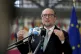 Austria's Foreign Minister Alexander Schallenberg speaks wit