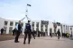 Pro-Palestinian protesters hang banners from the top of Parl