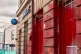 A Barclays bank covered in red paint 
