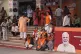 Supporters of Bharatiya Janata Party watch the proceedings o