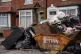 Furniture and uncollected refuse bags in the Sparkhill area 