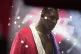 Former heavyweight champ Evander Holyfield walks into the ri