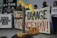 Activists participate in a demonstration for climate finance