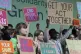Activists participate in a demonstration against fossil fuel