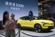 A live streamer works near the Volvo EX30 fully electric sma