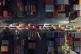 Trucks line up to depart from a container terminal in Nanjin