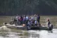 Residents cross a river to Venezuela from Colombia's Tibu, J