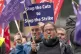 Lecturers and other university staff take part in a rally on