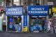 A man walks into a money exchange office, in London, January