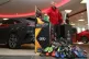 Eidur Gudjohnsen drops a pair of football boots into a donat