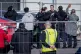 Tesla CEO Elon Musk (4th from right) arrives at the Tesla Gi