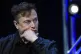 Tesla and SpaceX chief executive officer Elon Musk listens t