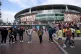 Fans arrive at the stadium before the Premier League match a