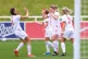 Ellen White (second right) celebrates with teammate Jill Sco