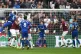 Everton's Kurt Zouma (left) scores his side's first goal of 