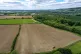 A farmer works in a field at Wotton, near Dorking in Surrey