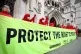 Extinction Rebellion activists protest outside the Royal Cou