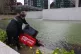 Activists pour blood-red dye into US Embassy pond in protest