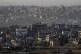 Destroyed buildings stand inside the Gaza Strip, as seen fro