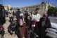 Mourners react during the funeral of Palestinians killed in 