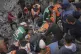 Alaa Manoun, who is seven months pregnant, is rescued from h