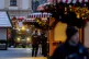 Public workers clean the Christmas Market, where a car drove