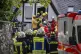 A person is rescued from the partially collapsed hotel in Kr