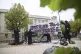 A participant sprays a banner reading ‘Russia is waging a 
